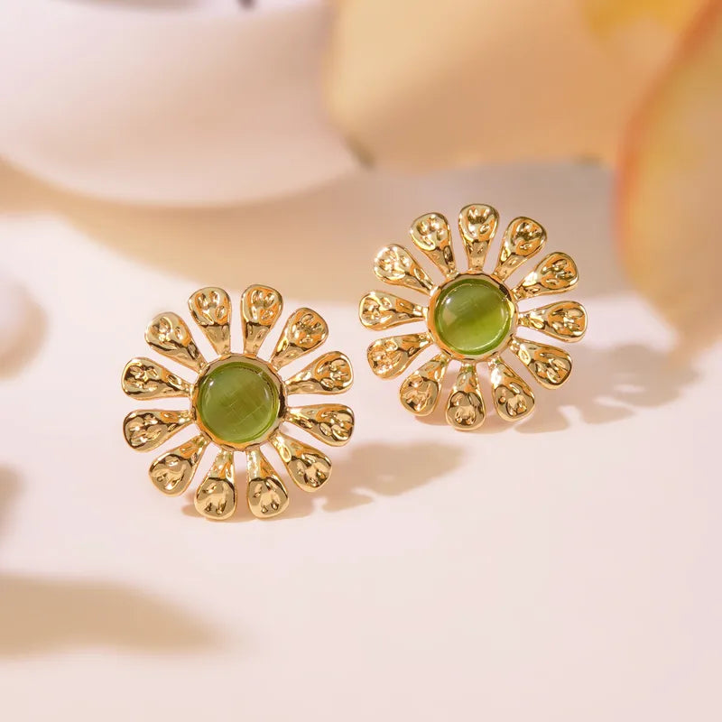 Boucle d'oreille Fleur or pierre (Acier)