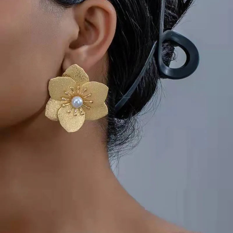 Boucle d'oreille fleur or (Acier au Titane)