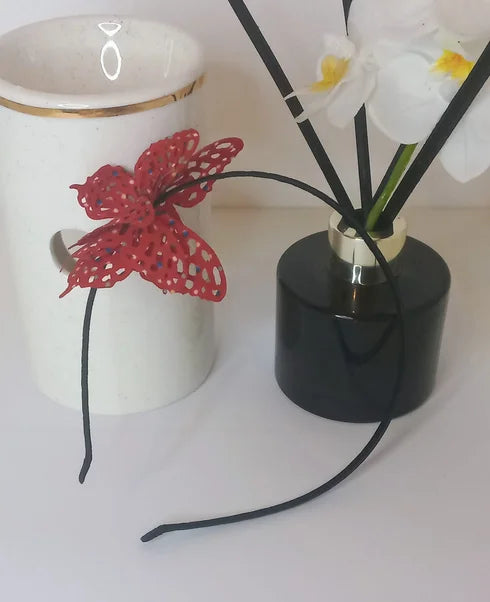 Serre tête papillon rouge S1424