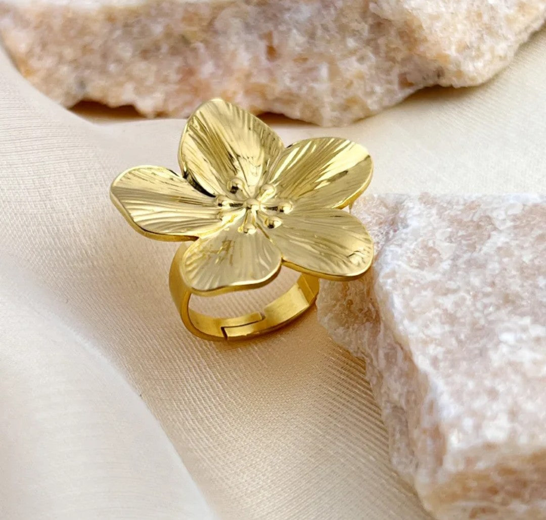 Bague réglable fleur or (Acier)