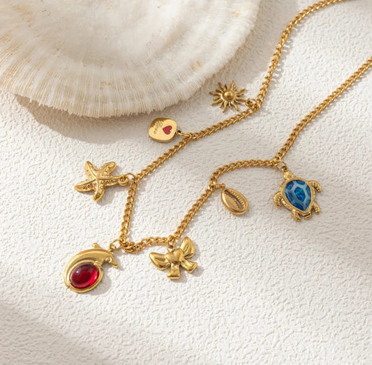 Collier or pampille dauphin (Acier)